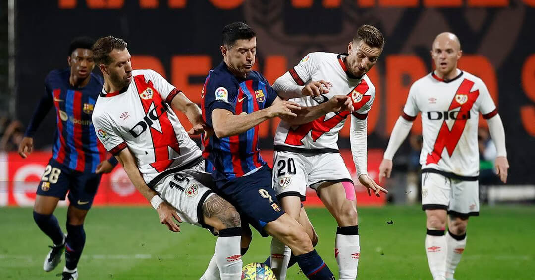 Soccer-Barcelona stunned by Rayo Vallecano in surprise 2-1 defeat 