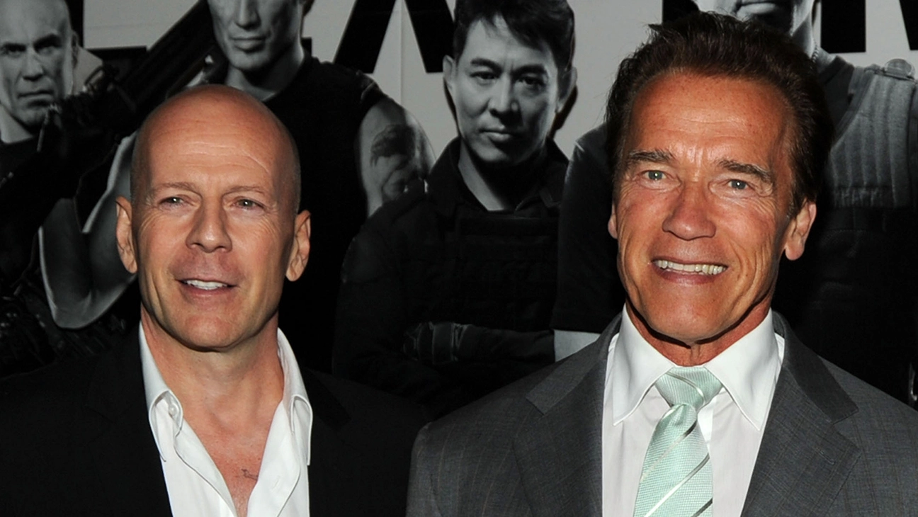Arnold Schwarzenegger shows support for Bruce Willis