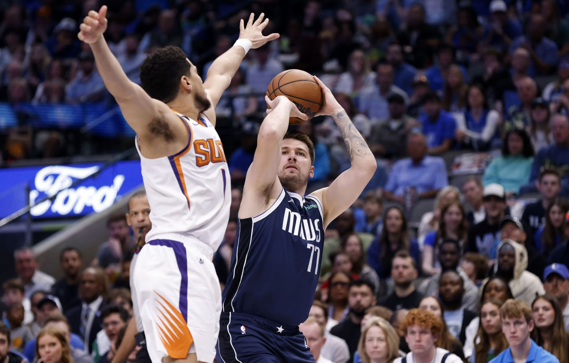 Luka Doncic, Devin Booker exchange words as Suns top Mavs